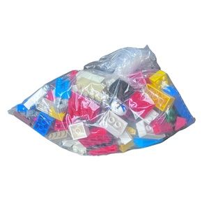 Grab bag Lego pieces. Mixed pieces contains at least one man. As is.